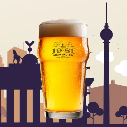 19-81 Brewing Co. pint of beer with Berlin skyline backdrop.