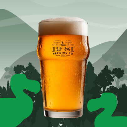 1981 Brewing Co Dodo beer in pint glass with dodo silhouettes and island backdrop.