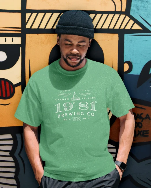 Man in green Cayman Islands Brewing Co. 1981 t-shirt.