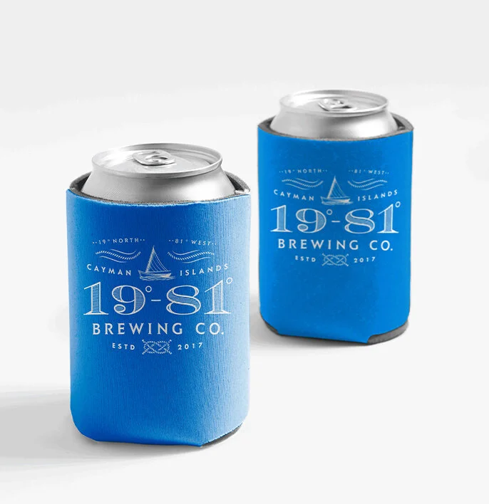 Two blue Cayman Islands Brewing Co. can coolers.